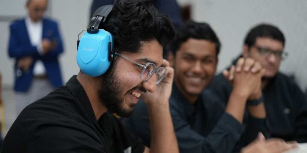 Student wearing noise headphones